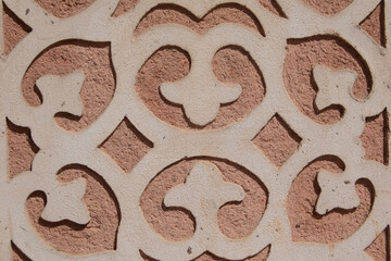 a facade of a building decorated with ornamental reliefs, typical of the houses of Segovia. Spain
