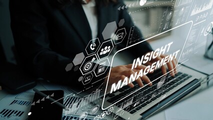 Professional Businesswoman Typing on Laptop with Digital Insight Management Overlay in Office Workspace. Asymptotic smart data analytic.