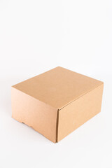 Mock-up of cardboard box, product and paracel packaging isolated on White background. Vertical orientation.