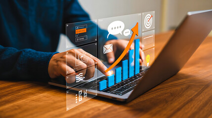Person using laptop with glowing business charts and checklist icons symbolizing analytics, growth and digital planning