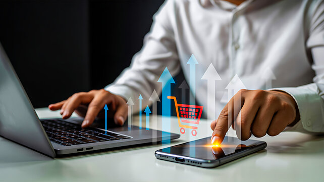 Person using laptop and smartphone with glowing shopping cart icon and upward arrows symbolizing e-commerce growth and mobile business strategy