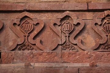 Traditional Carved Stone Frieze Featuring Mughal Floral Patterns