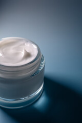 Skincare cream in a glass jar, a luxurious cosmetic product for facial beauty, moisturizing and...