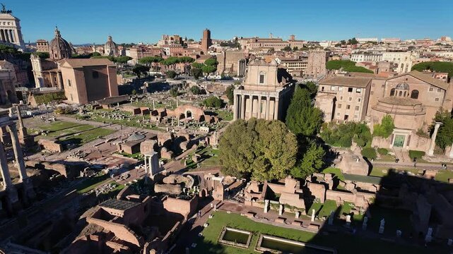 Aerial orbiting view of the Roman Forum ancient ruins in Rome, Italy