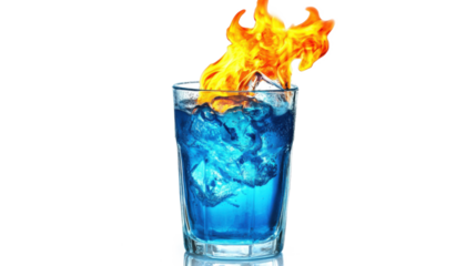 A glass of blue liquid with a flame on top. The flame is yellow and orange. Concept of danger and excitement