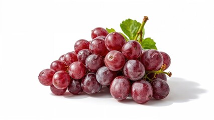 Fototapeta premium Red grapes arranged with a green leaf, fresh fruit, and healthy snack. Natural food, produce, and nutrition. Freshness and fruit theme.