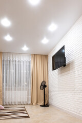 Interior of a residential apartment, house, TV on the wall