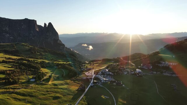Cinematic aerial video of the Alpe di Siusi in the Italian Dolomites during morning golden hour