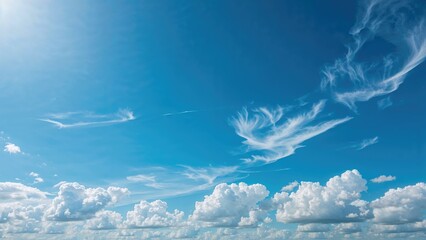 Cloudscape with blue sky and white clouds