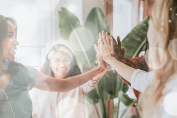 Team giving each other a high five