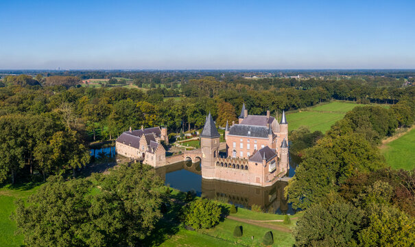 Aerial view of moated Heeswijk castle, Netherlands - Powered by Adobe