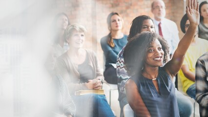 A group of diverse audience in a meeting