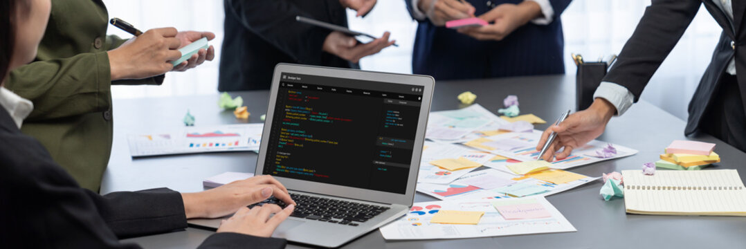 Analyst team use sticky note for creative and analytic brainstorm for business idea with BI data dashboard on laptop screen. Analysis financial data visualization tech for marketing strategy. Prodigy
