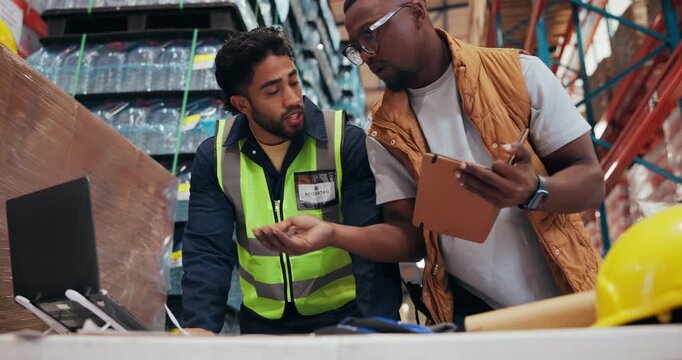 Businessmen, meeting and discussion with laptop in warehouse for building improvement or renovation. Male people, employees or planning with computer for shipping or supply chain maintenance in depot