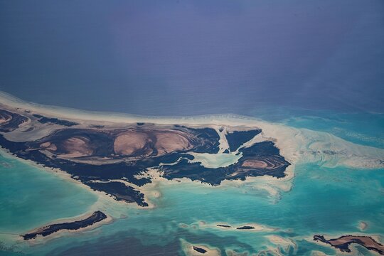 Saudi Arabian islands in the red sea distant view from a passing plane - Powered by Adobe