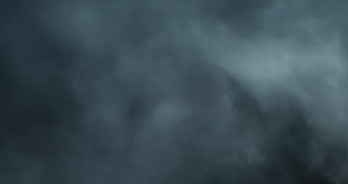 Soft cinematic 4K VFX footage of fog, smoke, and mist blending through air, creating a surreal, artistic, and vaporous atmosphere with elegant motion and dreamy haze for visual storytelling.