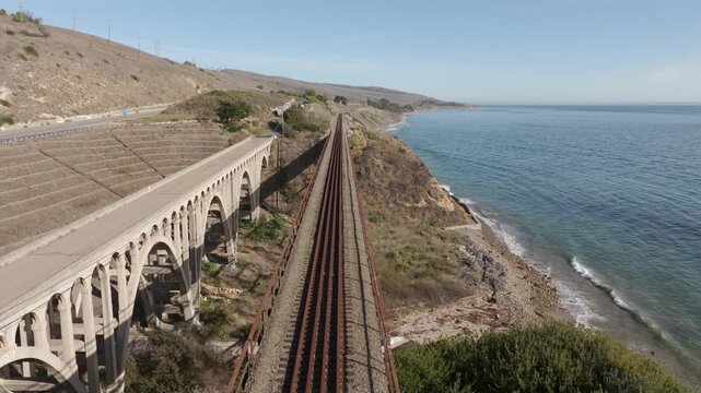 Gaviota, California - Gaviota Bridge Aerial View on a Sunny Day With Train Tracks, Graffiti Art and Rest Area in Santa Barbara County, Next to the US Route 101 Freeway, Next to the Pacific Ocean