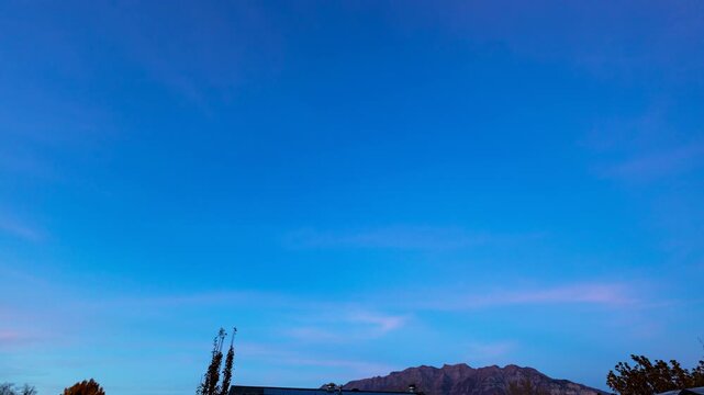 Holy Grail Timelapse from sunset to night with Northern Lights over Timpanogos Mountain from Orem, Utah.