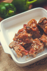 Golden-Brown Meat with Sauce: Close-up of a Hot Dish