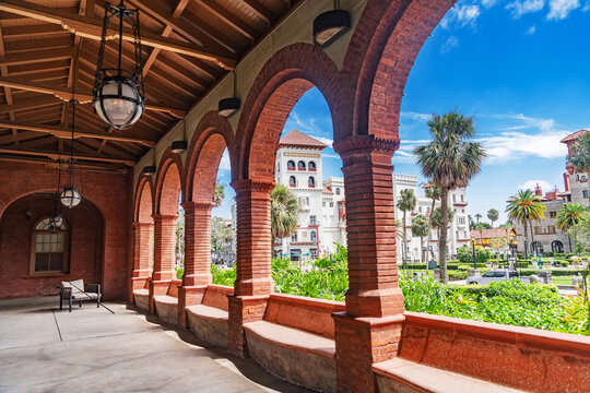 Spanish-style of Flagler College with palm trees and with arches