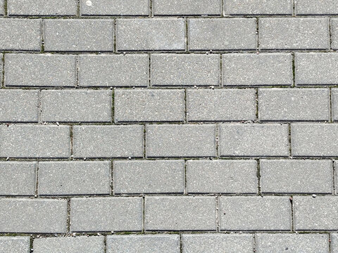Fondo de textura de pavimento de adoquines rectangulares de hormig&oacute;n gris con patr&oacute;n de ladrillo