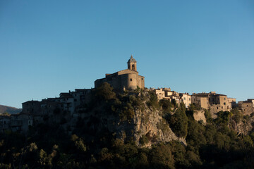 silhouette of a monastery