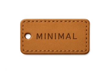 Brown leather tag with minimal debossed branding