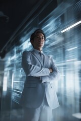 Fototapeta premium Confident asian businessman in futuristic office environment