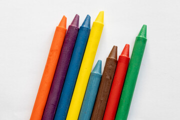 Close-Up of Pastel Crayons and Sketchbook
