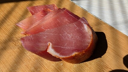 Thin ham slices with bread, Cozy brunch scene with meat and cheese