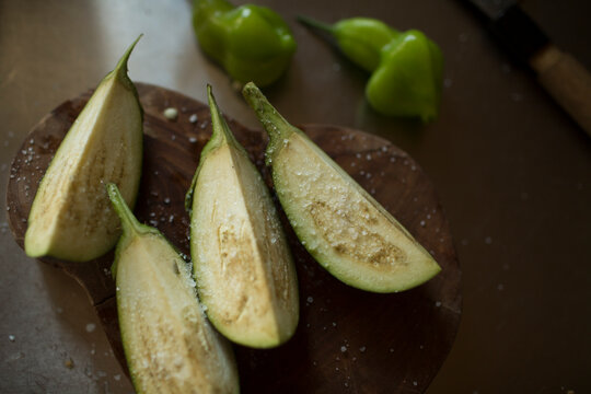 eggplants on cutting board with salt