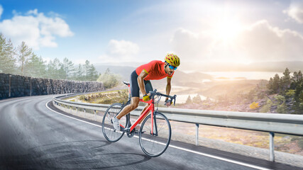 Cycling. A captivating shot of a helmeted biker riding along an asphalt road, demonstrating the freedom and excitement of road riding. Cycling competitions. Active recreation. Sport.