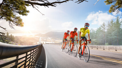 Cycling. A captivating shot of a helmeted biker riding along an asphalt road, demonstrating the freedom and excitement of road riding. Cycling competitions. Active recreation. Sport.
