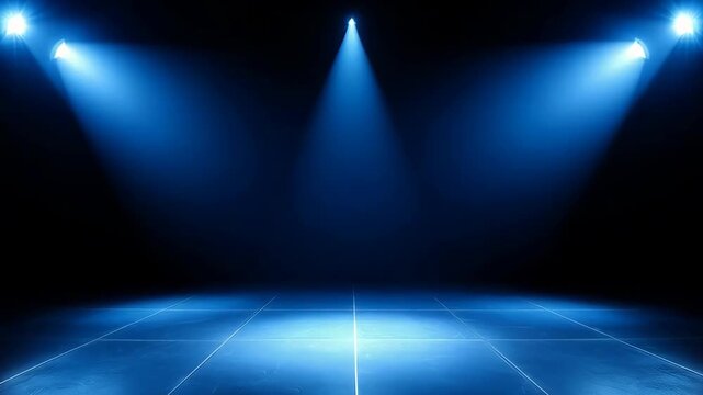 Bright Blue Stage Spotlights Illuminating Dark Empty Arena Floor with Reflective Surface and Grid Lights on Dark Background