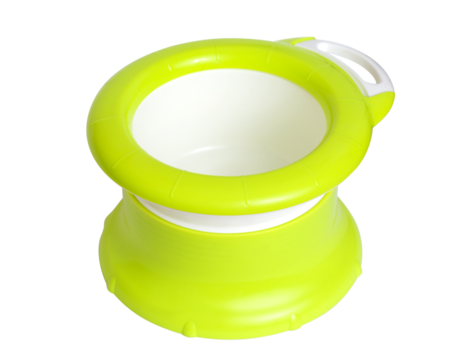 Light green and white children's collapsible travel potty. A close-up of a mobile, functional potty for the toilet. Travel accessories. Isolated