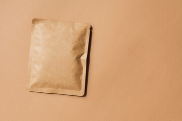 Blank craft plastic pouch, white pack on studio background with shadow, mylar bag isolated for coffee or food, cosmetic products, snack, candy. Different sizes, mock up.