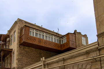 Baku, Azerbaijan. View of a traditional wooden balcony of a house in the center of the old city.