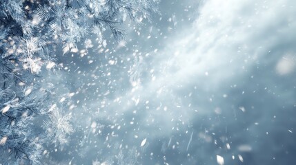 Fototapeta premium Snowy Winter Scene with Falling Snowflakes and Pine Trees in Soft Focus Against a Tranquil Blue Background Exuding a Calm and Serene Atmosphere