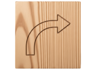 Wooden block with carved right turn arrow indicating direction or navigation