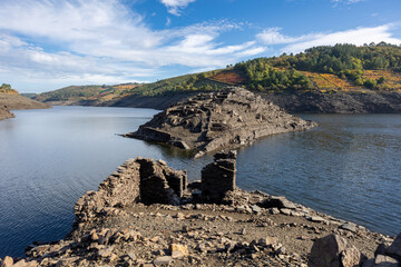 Castro candaz village ruins emerging from shallow reservoir water