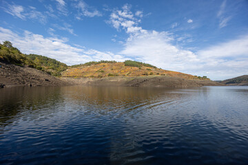 Reservoir with low water levels during autumn drought