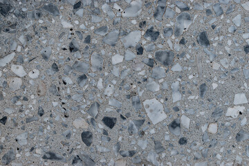 Old dirty outdoor floor texture made of worn terrazzo material