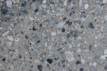 Old dirty outdoor floor texture made of worn terrazzo material