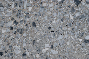 Old dirty outdoor floor texture made of worn terrazzo material