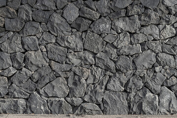 Natural volcanic stone wall texture from Tenerife, Spain