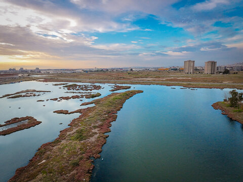 Serene Coastal Landscape at Sunset