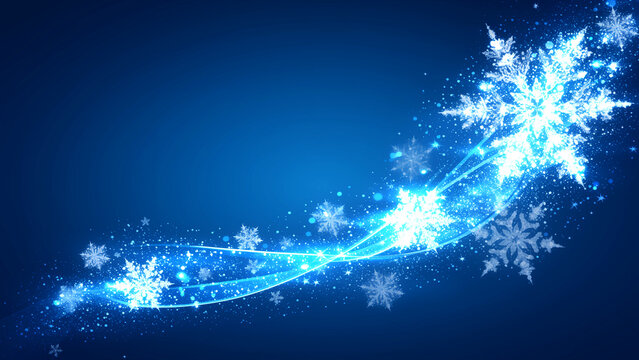青い背景に舞う輝く雪の結晶と光の波