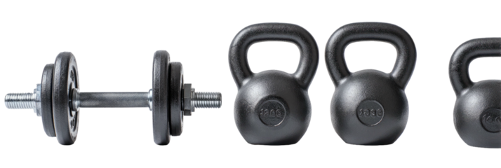 Kettlebells and dumbbell lined up on black background, gym equipment