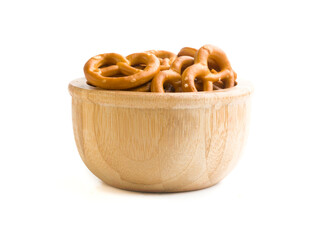 German pretzels in a bowl on a white background