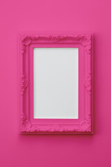 pink picture frame on pink wall